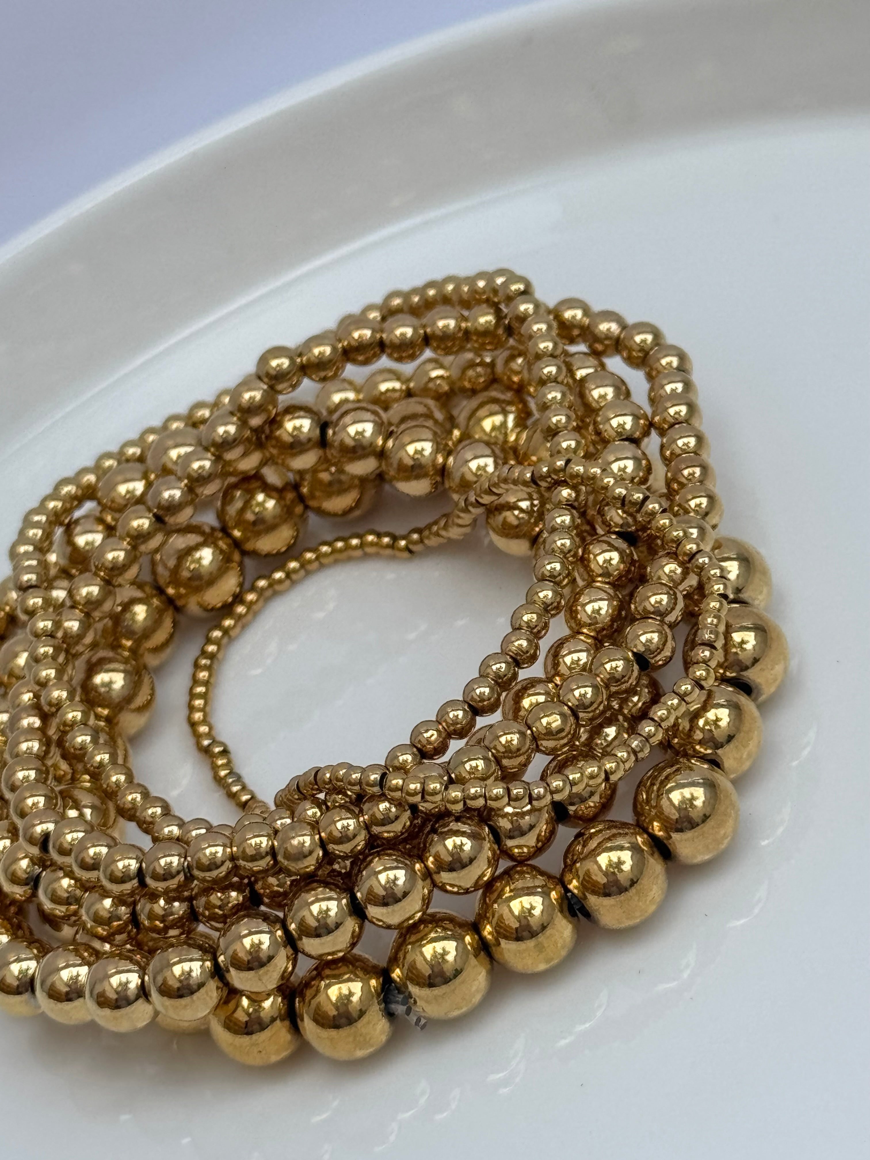 SET DE PULSERAS BOLITAS