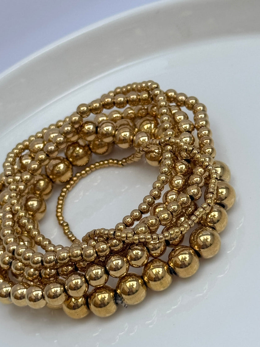 SET DE PULSERAS BOLITAS