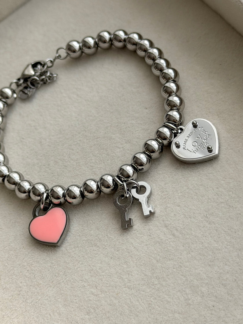PULSERA BOLITAS CON LLAVES