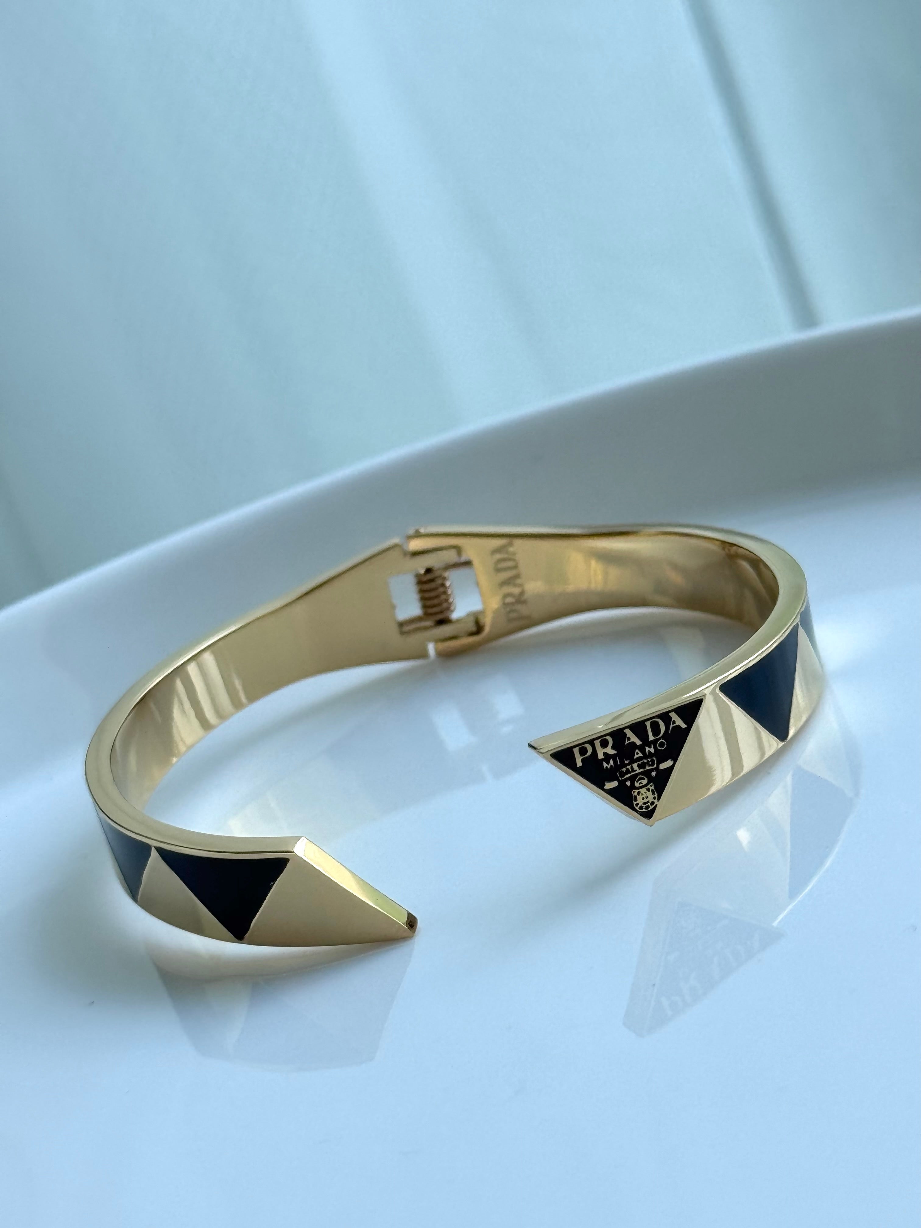 BRAZALETE ABIERTO PRADA