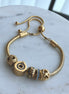 PULSERA CON CHARS