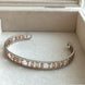 BRAZALETE ABIERTO LETRAS TOUS