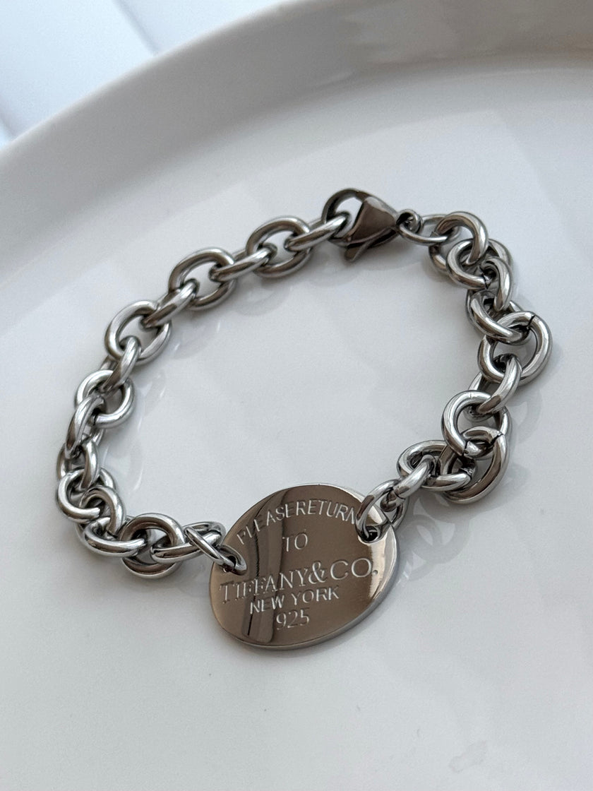 PULSERA TFNY PLACA OVALADA