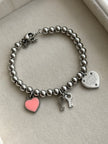 PULSERA BOLITAS CON LLAVES