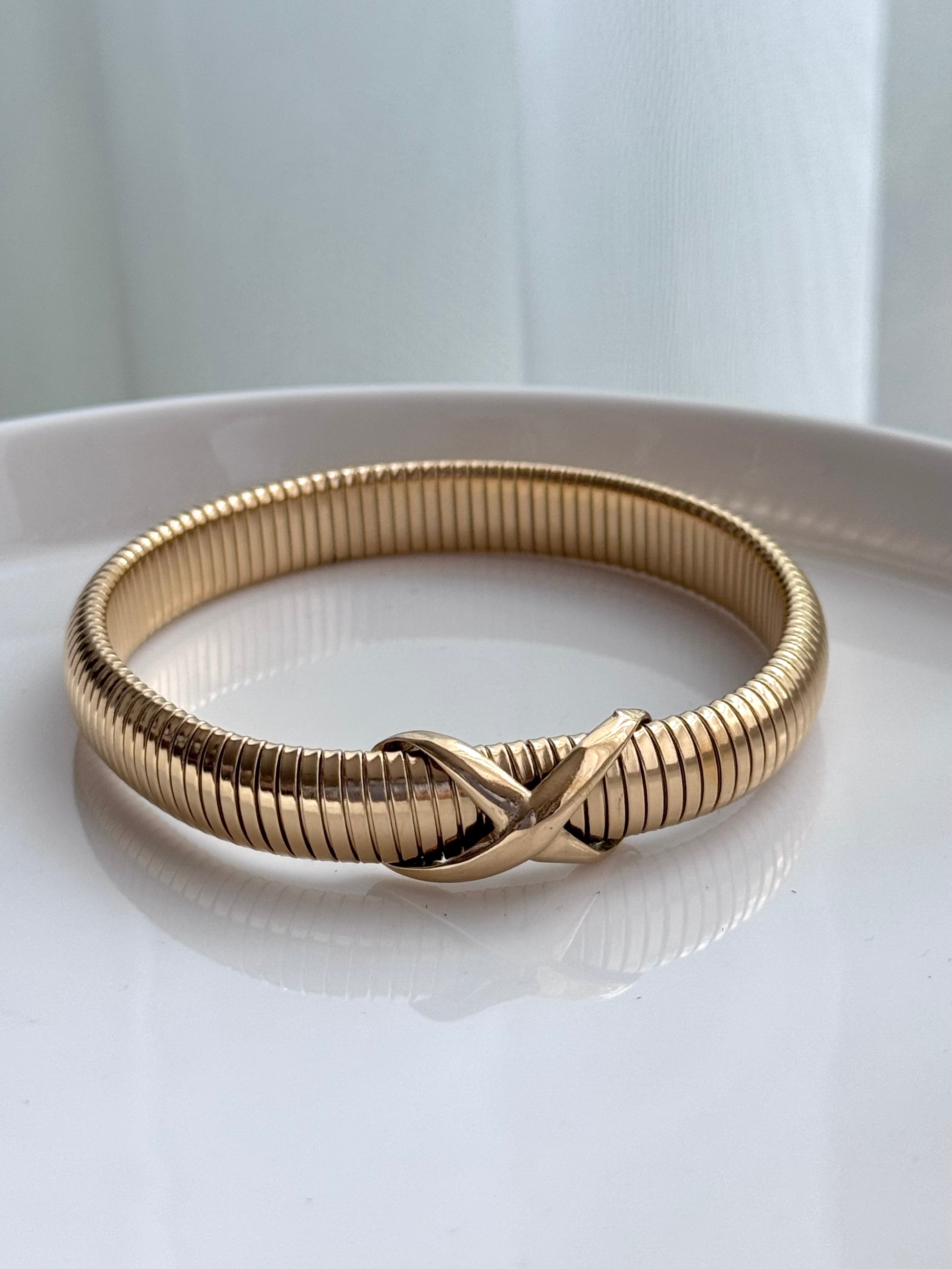 PULSERA CRUZ DELGADA DORADA