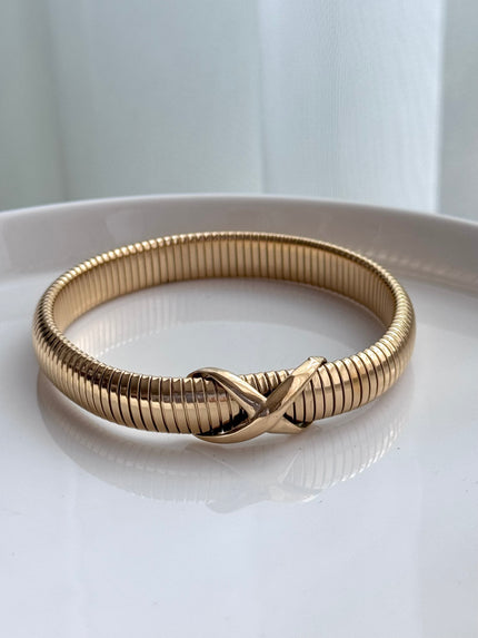 PULSERA CRUZ DELGADA DORADA