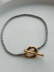 PULSERA BROCHE T Y CADENA BRILLOSA