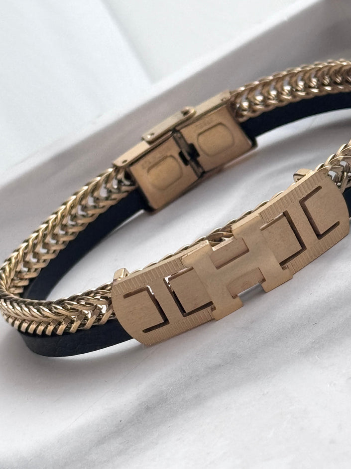 PULSERA PLACA H DORADA