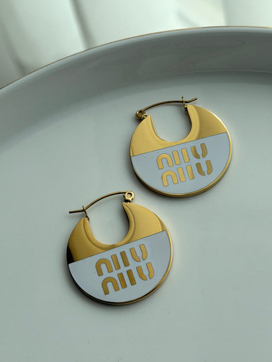 ARRACADA MIU MIU