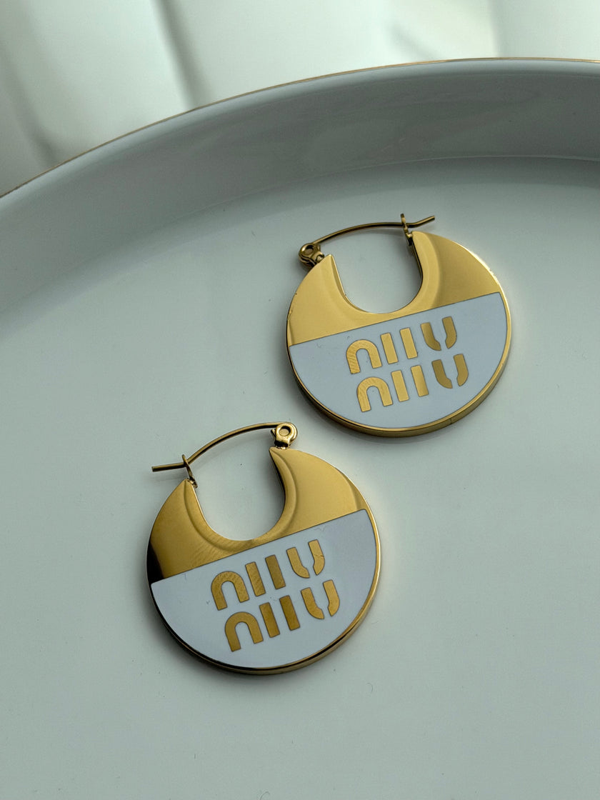ARRACADA MIU MIU