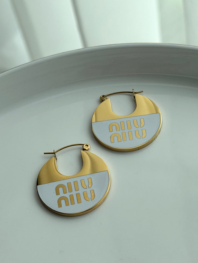ARRACADA MIU MIU