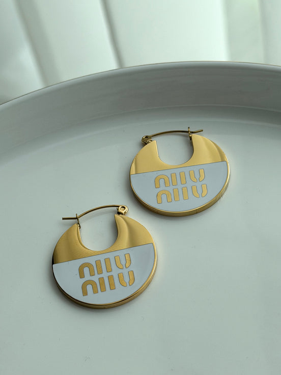 ARRACADA MIU MIU