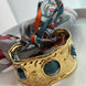 BRAZALETE CON MASCADA GRIS