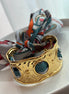 BRAZALETE CON MASCADA GRIS