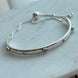 PULSERA MEDIA RIGIDA