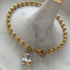 PULSERA BOLITAS CON OSO