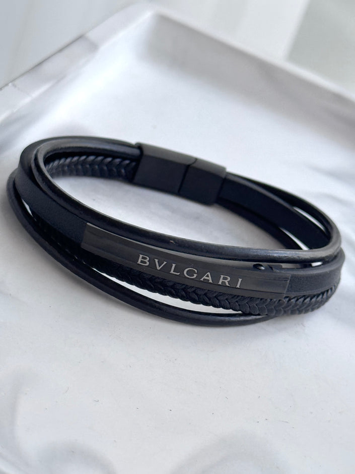 PULSERA TIRAS NEGRA