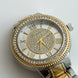 RELOJ BICOLOR CON CRISTAL