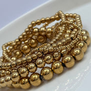 SET DE PULSERAS BOLITAS