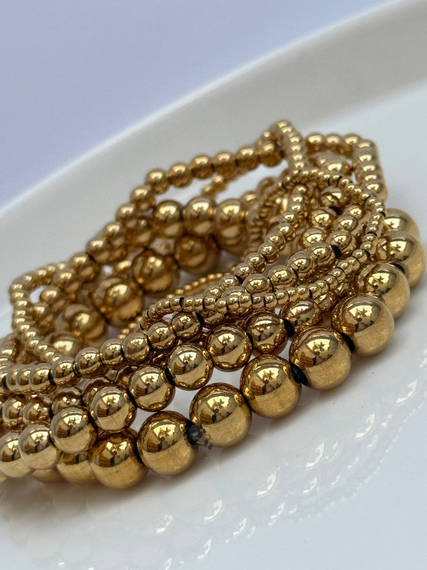 SET DE PULSERAS BOLITAS