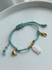 PULSERA HILO AZUL Y DIJES