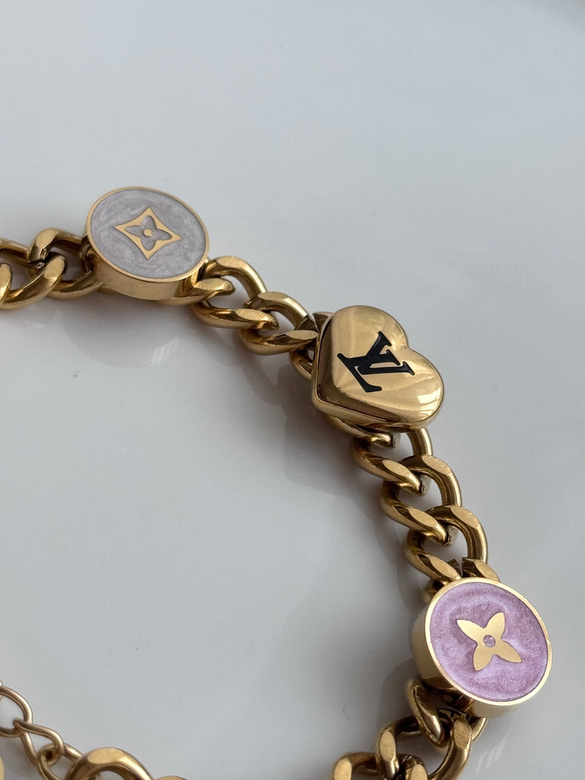 PULSERA CON DIJE LV
