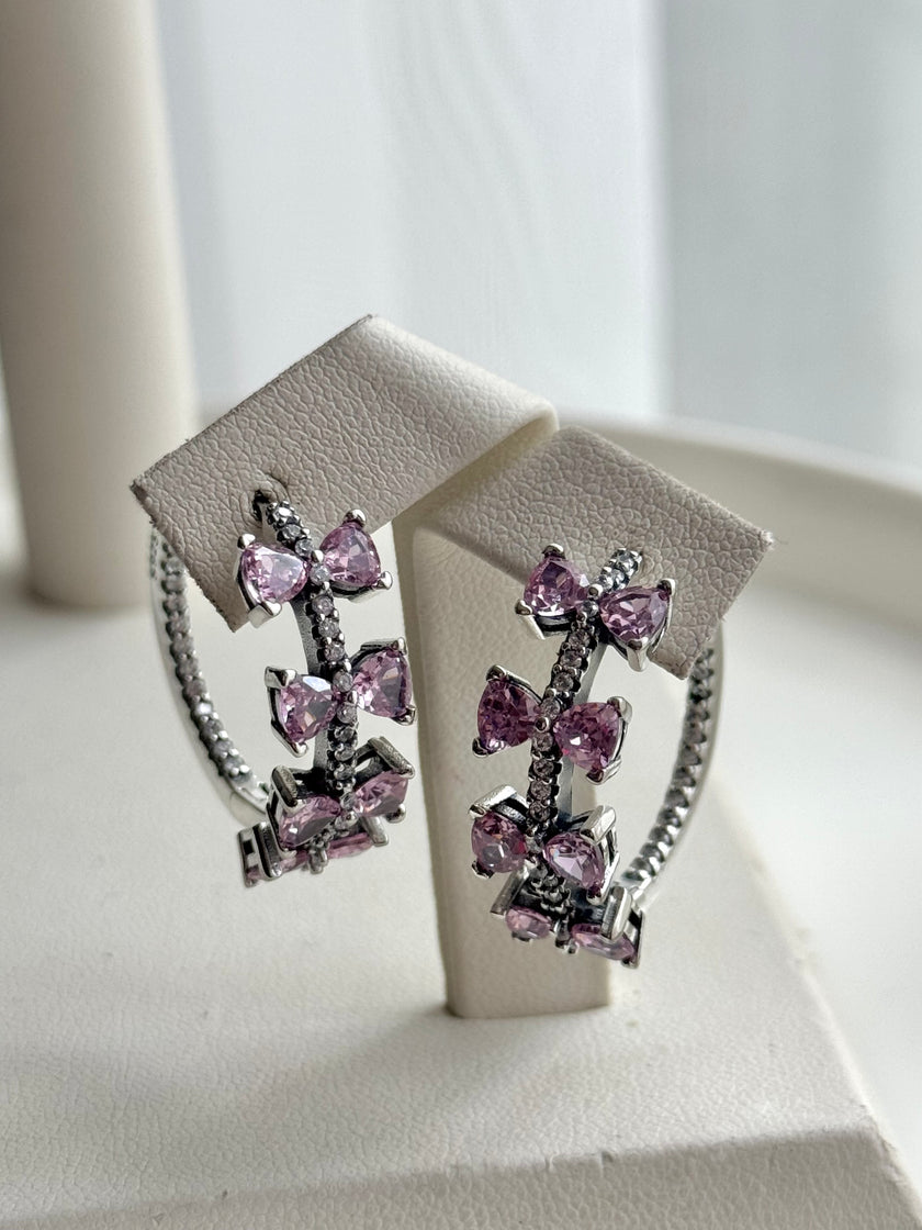 ARRACADA CON MOÑOS ROSA