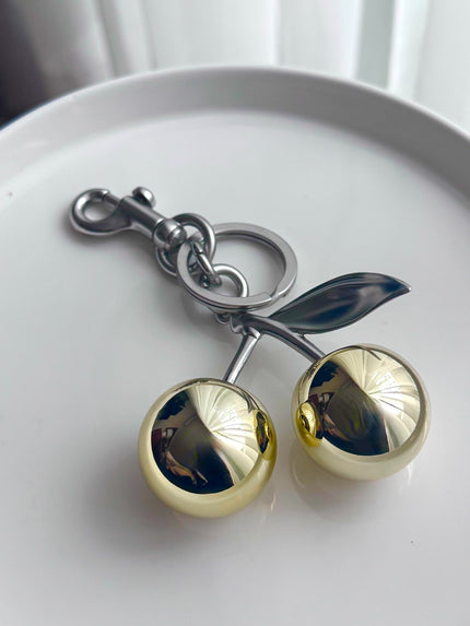 LLAVERO DORADO Y PLATEADO