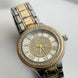 RELOJ BICOLOR CON CRISTAL