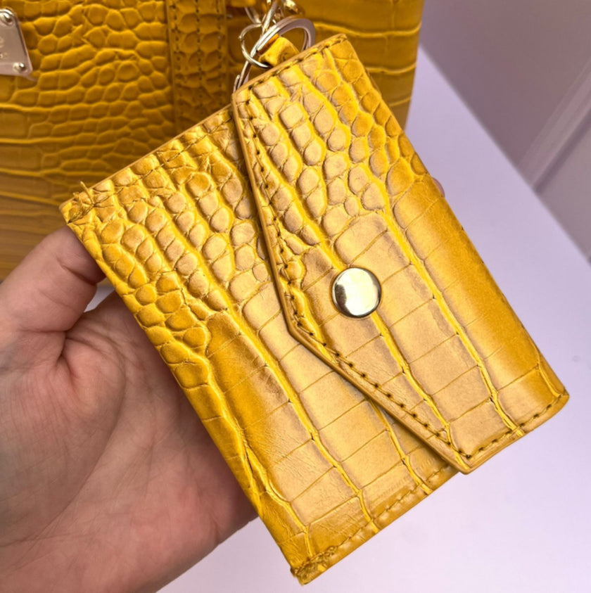 BOLSA BEBE AUBREY CROCO AMARILLA